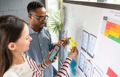 product designers working at a board